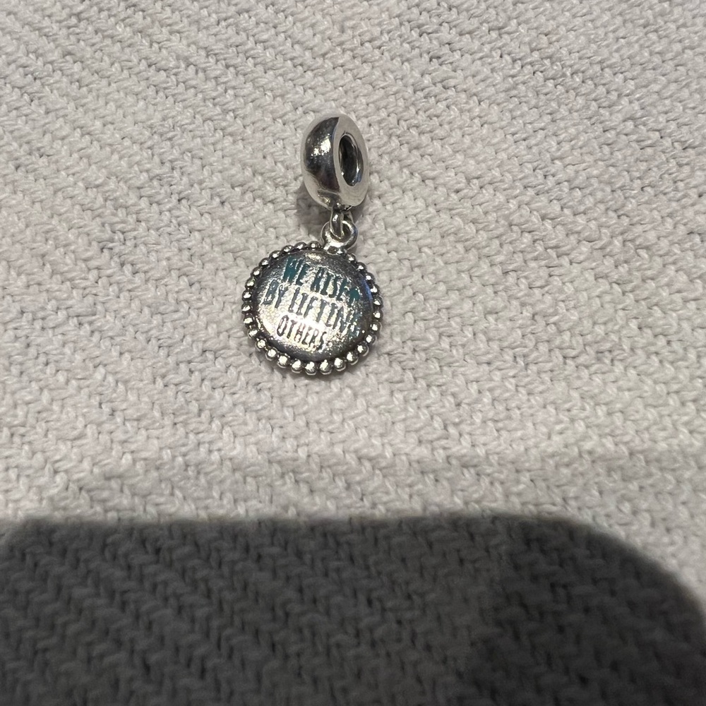 PANDORA We Rise By Lifting Others charm
